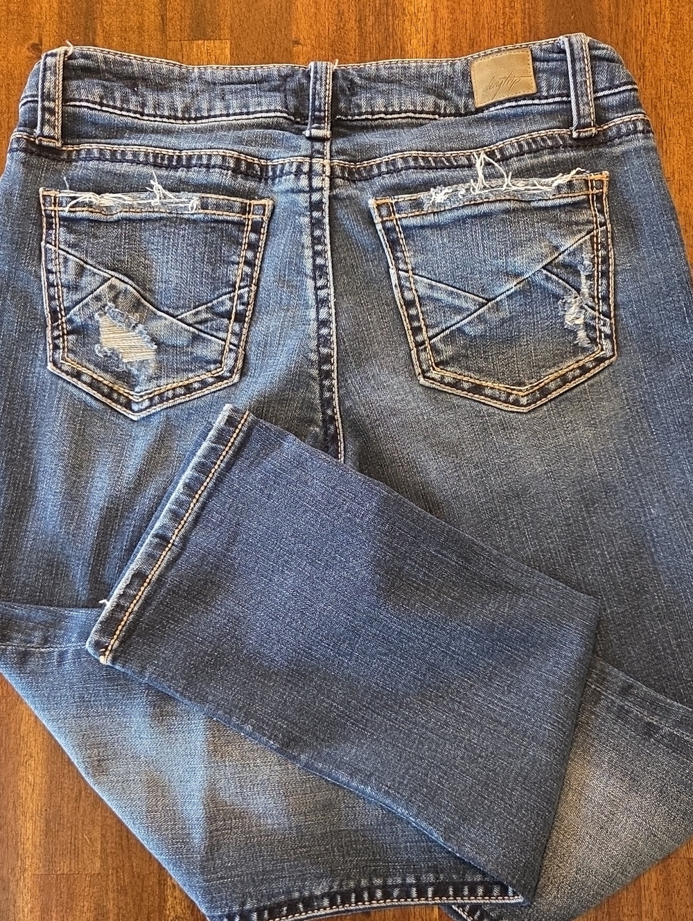 Daytrip Virgo, Straight Leg  jeans,by BUCKLE. Blue Distressed Back Pocket Jeans